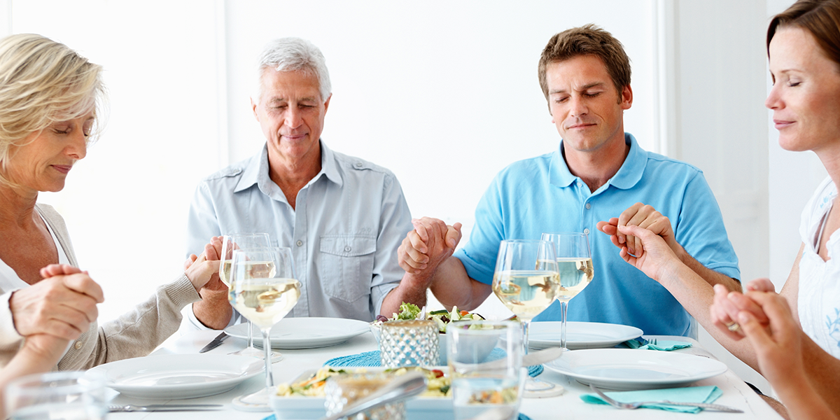 Praying At dinner table.